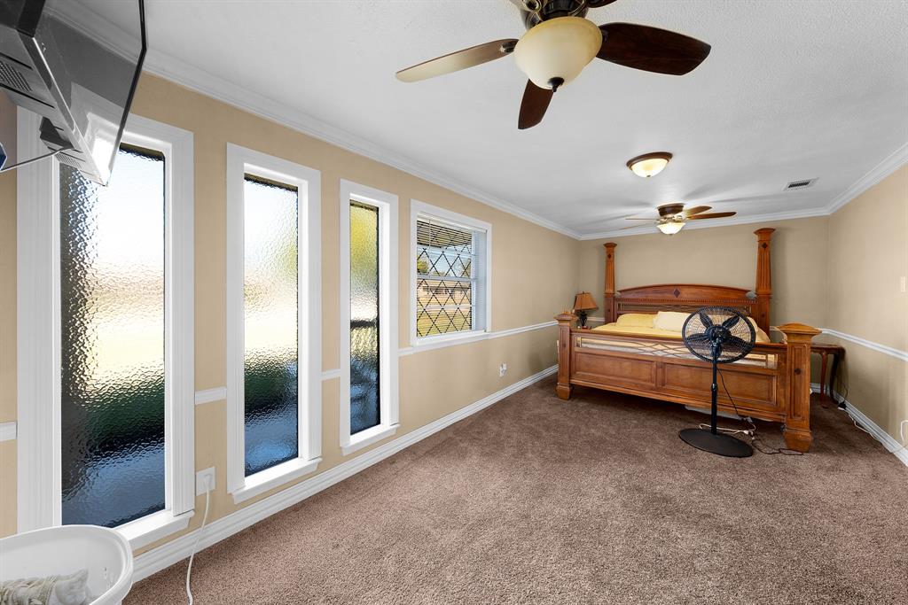 1075 Oak Ridge Drive Terrell, TX 75160 - Photo 20 of 28 a bedroom with bed and window