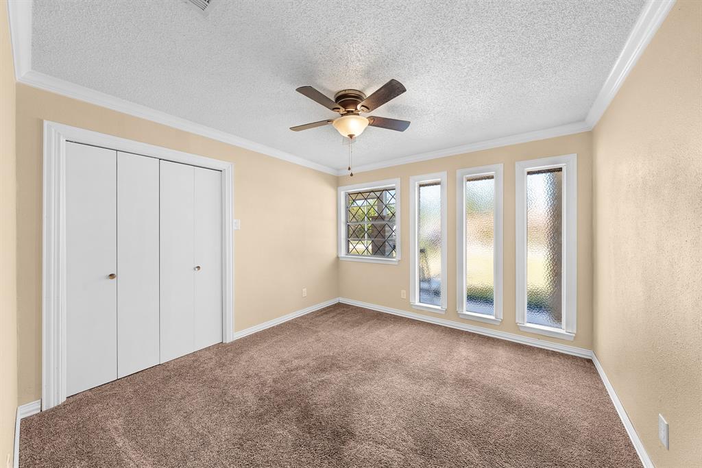 1075 Oak Ridge Drive Terrell, TX 75160 - Photo 22 of 28 a view of an empty room with a window