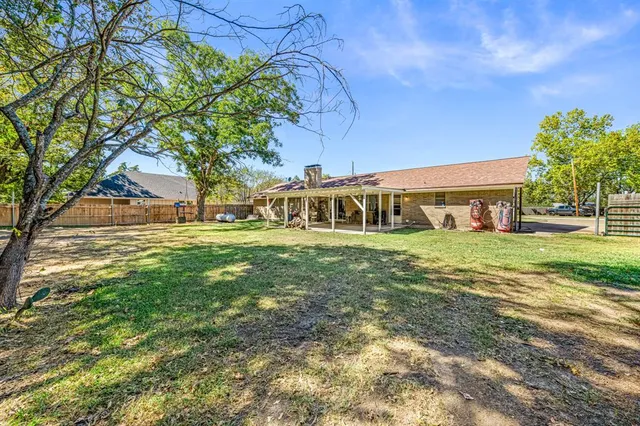 a front view of house with yard