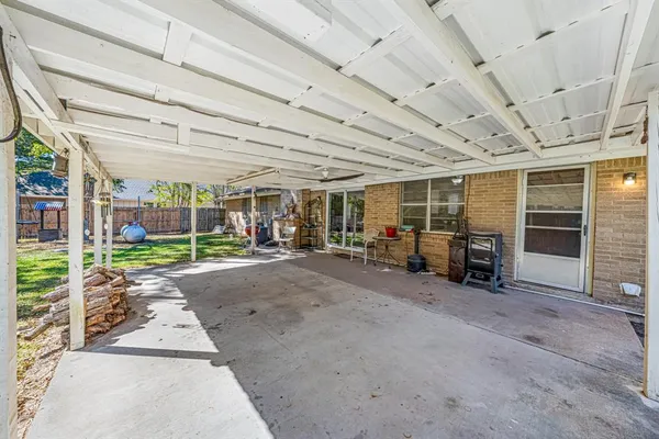 a view of a garage with chairs