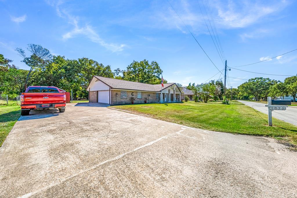1075 Oak Ridge Drive Terrell, TX 75160 - Photo 9 of 28 a house view with a backyard space