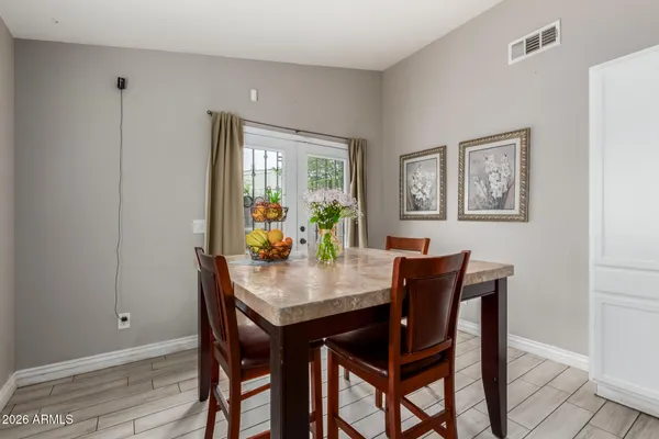 a view of a dining room with furniture