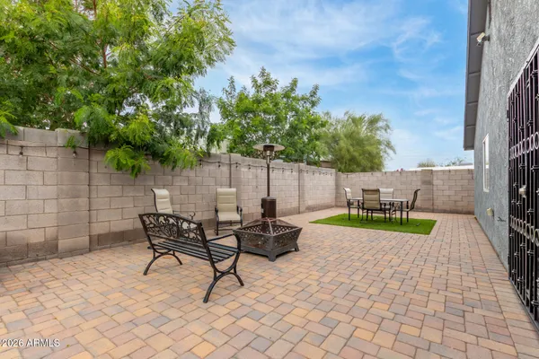 a view of a bench in a patio