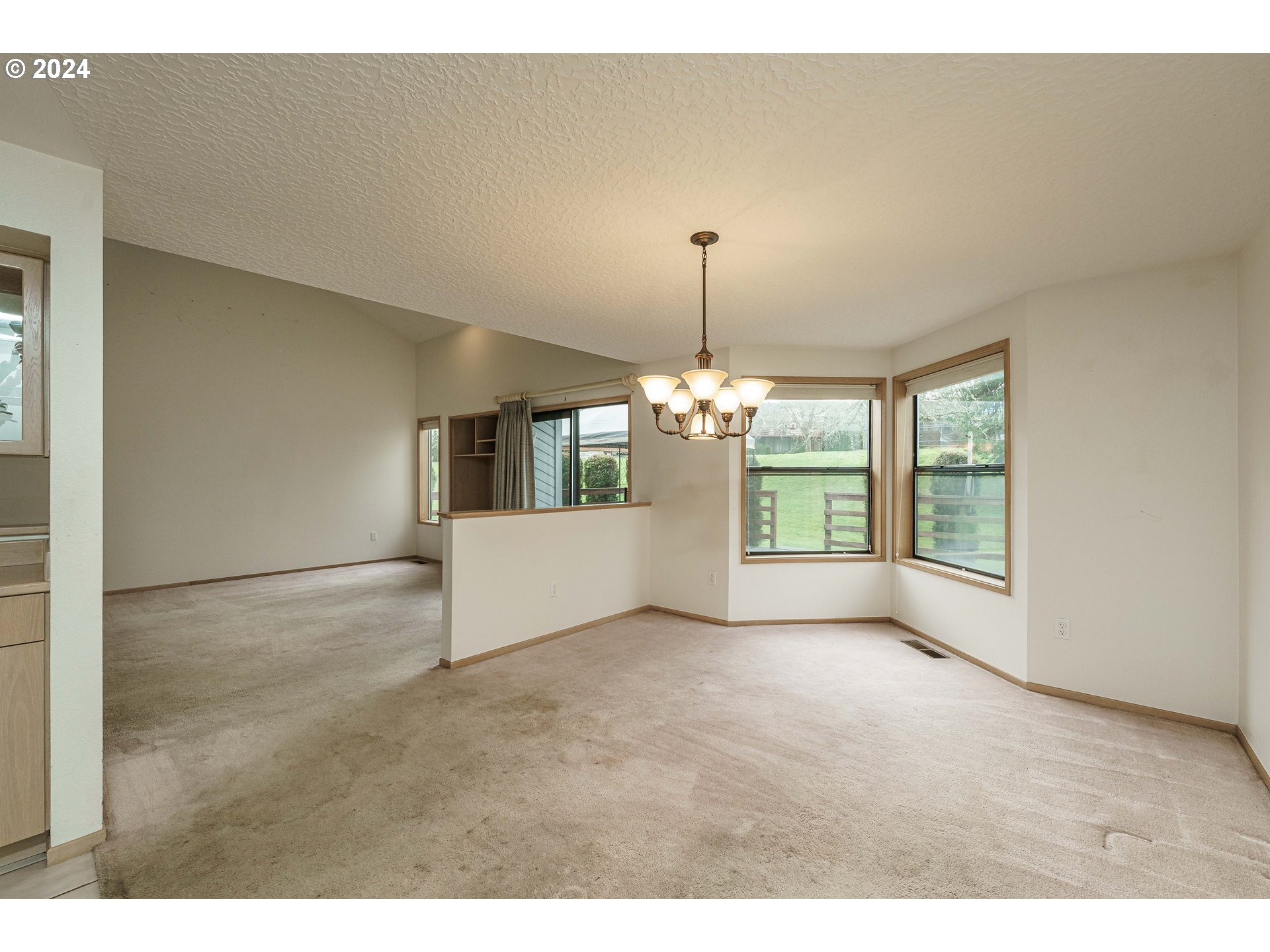 3300 Northeast 164th Street, Unit K2 Ridgefield, WA 98642 - Photo 16 of 40 a view of livingroom and kitchen with microwave