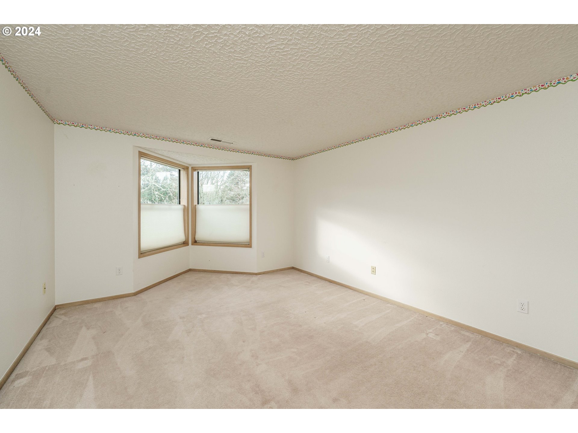 3300 Northeast 164th Street, Unit K2 Ridgefield, WA 98642 - Photo 30 of 40 a view of an empty room with a window
