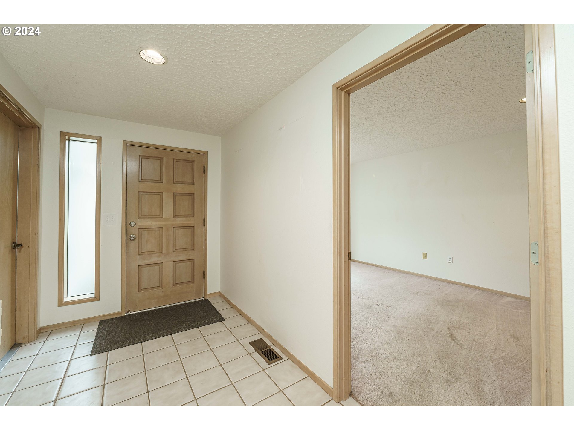 3300 Northeast 164th Street, Unit K2 Ridgefield, WA 98642 - Photo 4 of 40 a view of an empty room and window
