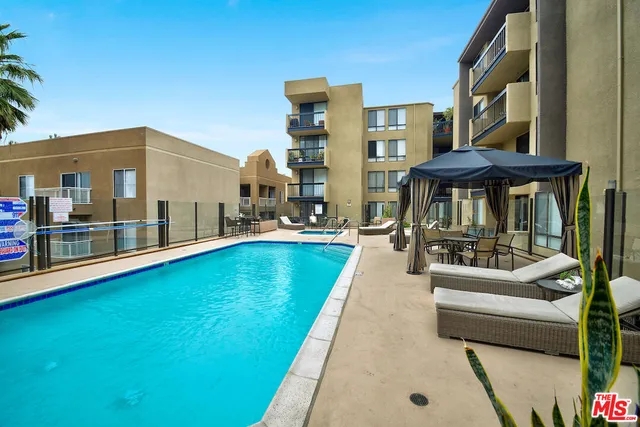 a view of a building with a swimming pool