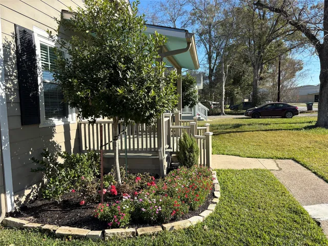 a view of a garden with a flower garden
