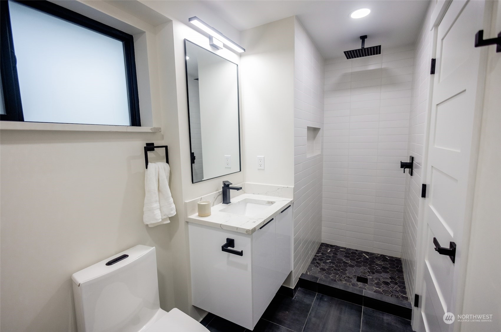 19911 82nd Place West Edmonds, WA 98026 - Photo 17 of 21 a bathroom with a sink toilet and shower