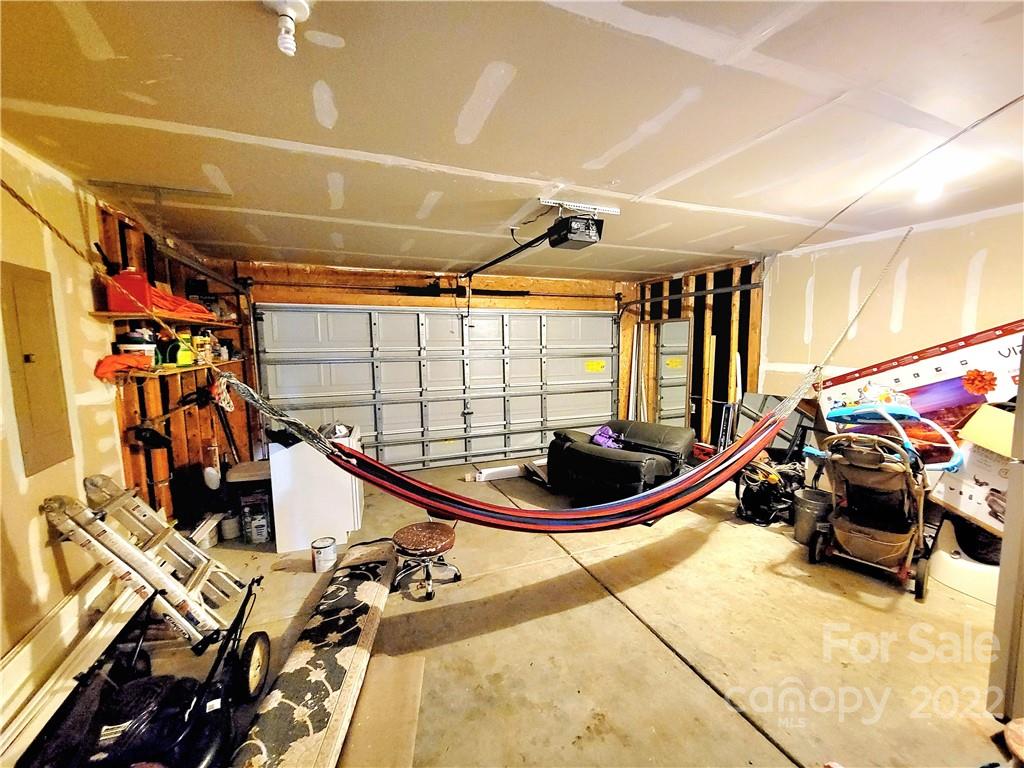 4724 Meadowfield Road Charlotte, NC 28215 - Photo 16 of 29 a view of a room with gym equipment