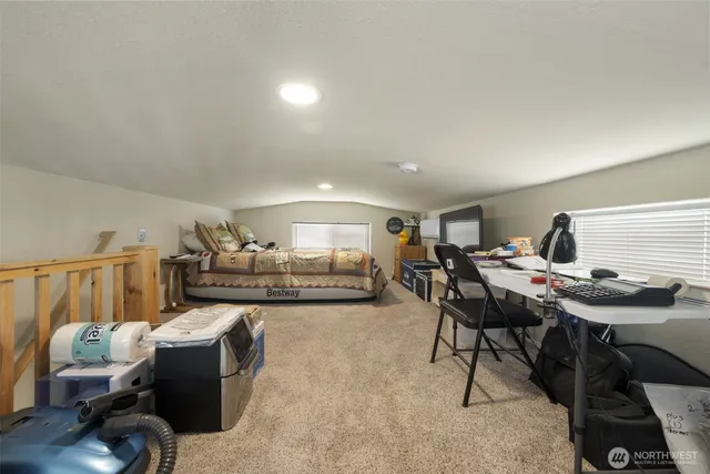 a living room with furniture and a table