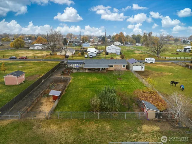 a view of a house with a big yard