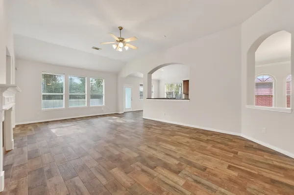 a view of an empty room with a window