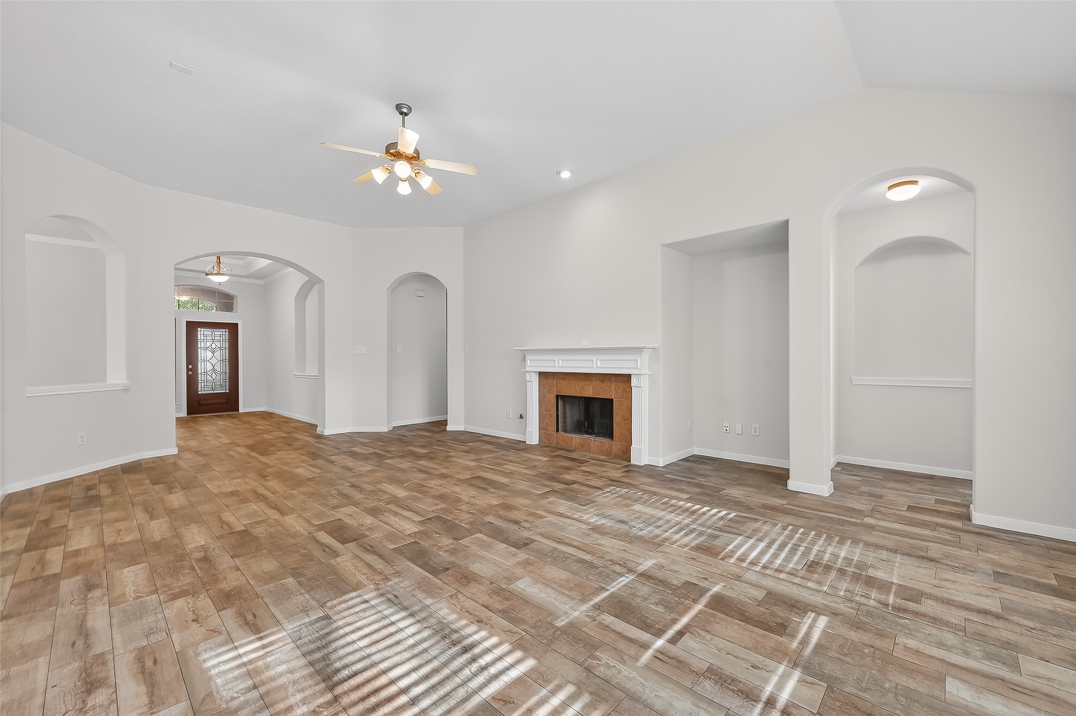 78 South Archwyck Circle Spring, TX 77382 - Photo 16 of 47 a view of empty room with fireplace