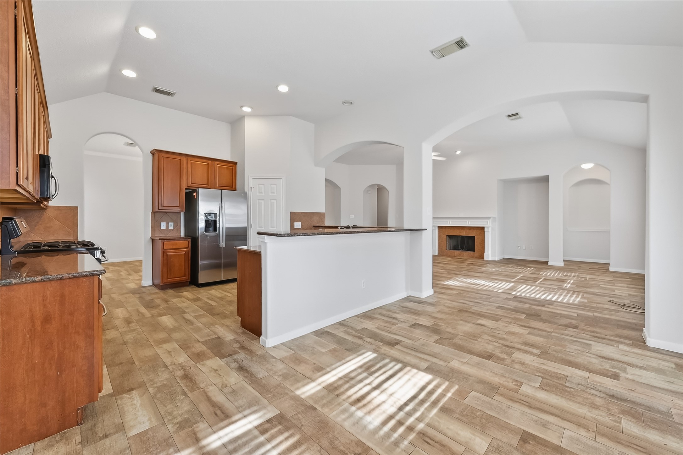 78 South Archwyck Circle Spring, TX 77382 - Photo 19 of 47 a view of a kitchen with a sink cabinets and a refrigerator