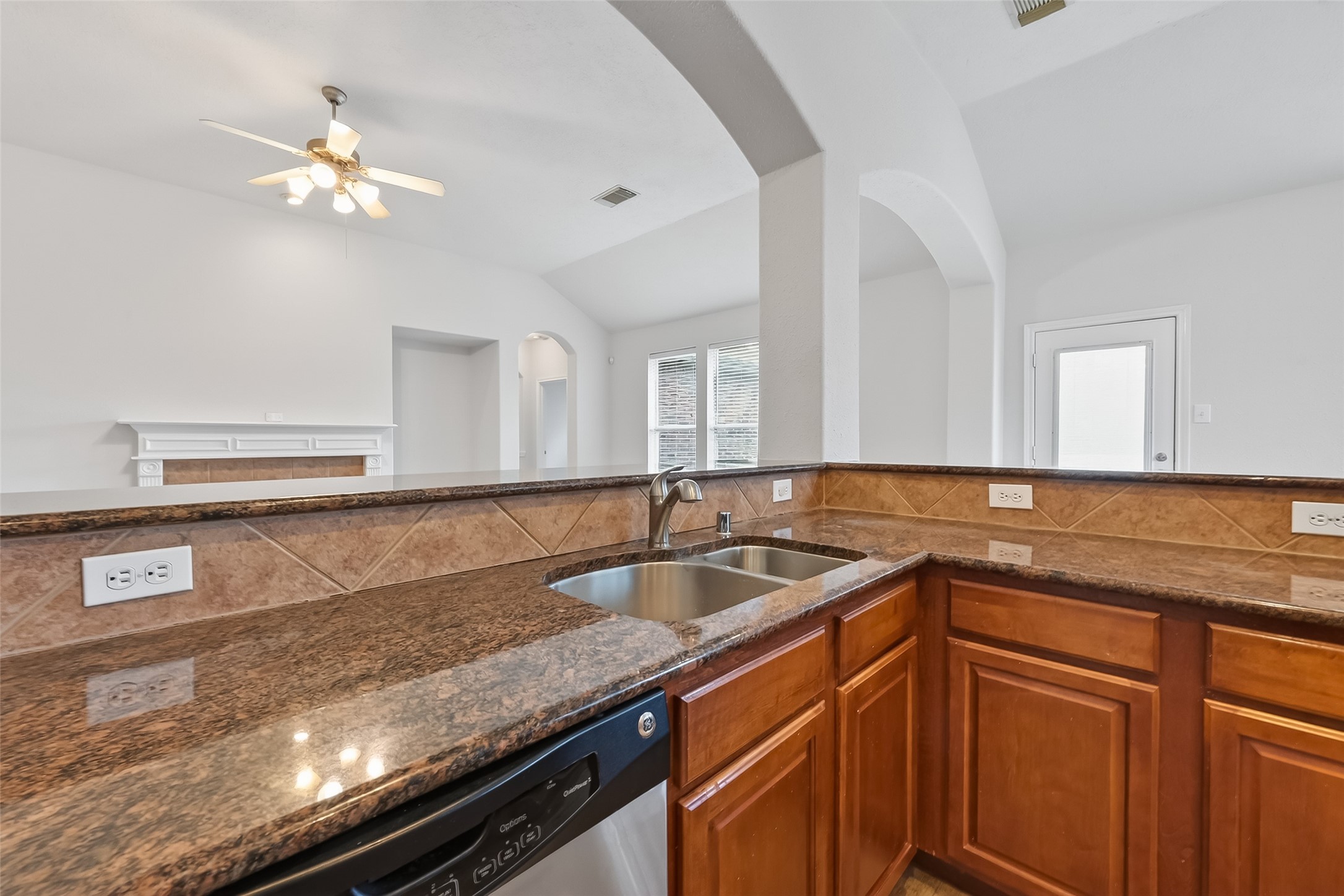 78 South Archwyck Circle Spring, TX 77382 - Photo 23 of 47 a kitchen with a sink and cabinets
