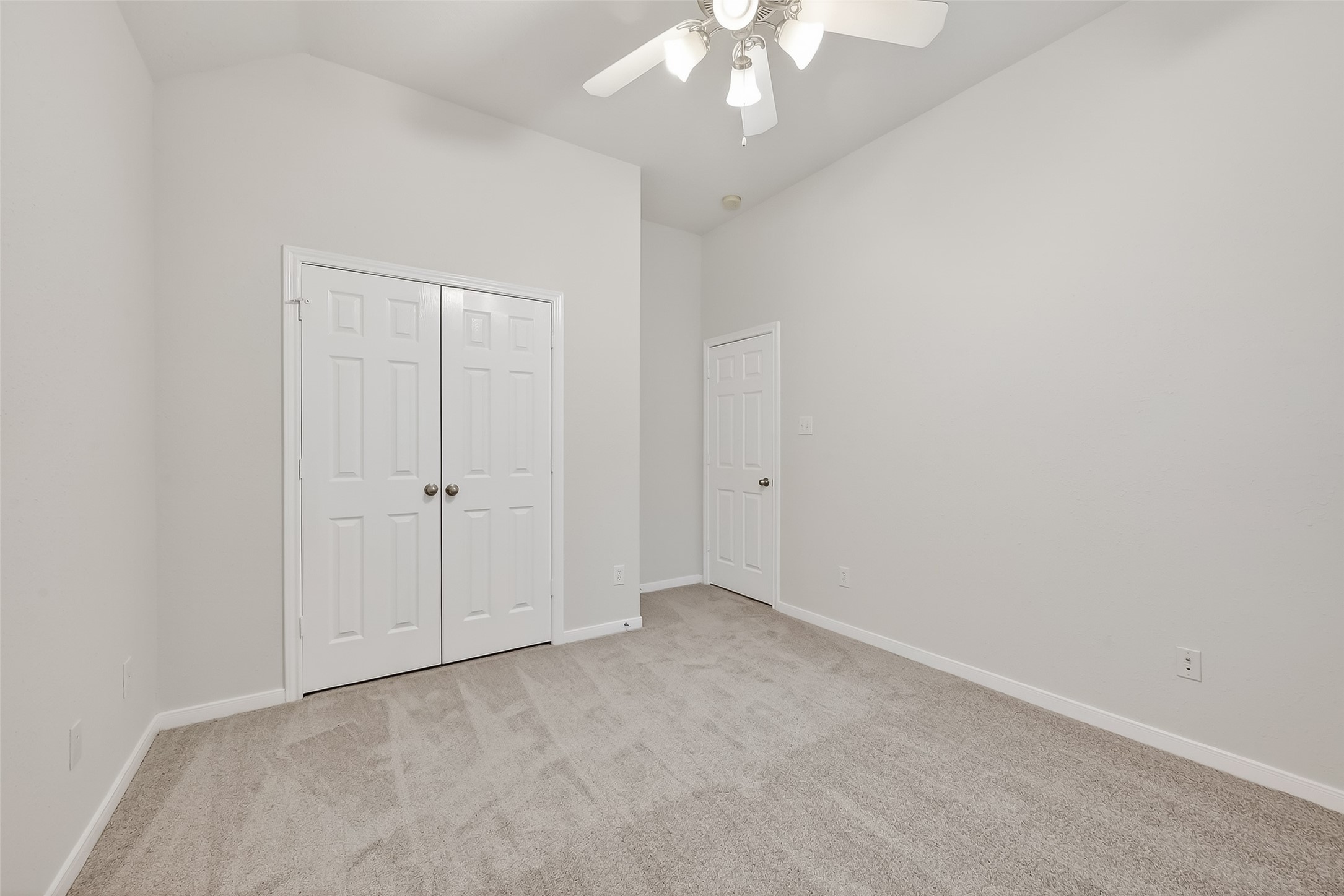 78 South Archwyck Circle Spring, TX 77382 - Photo 30 of 47 an empty room with a chandelier fan