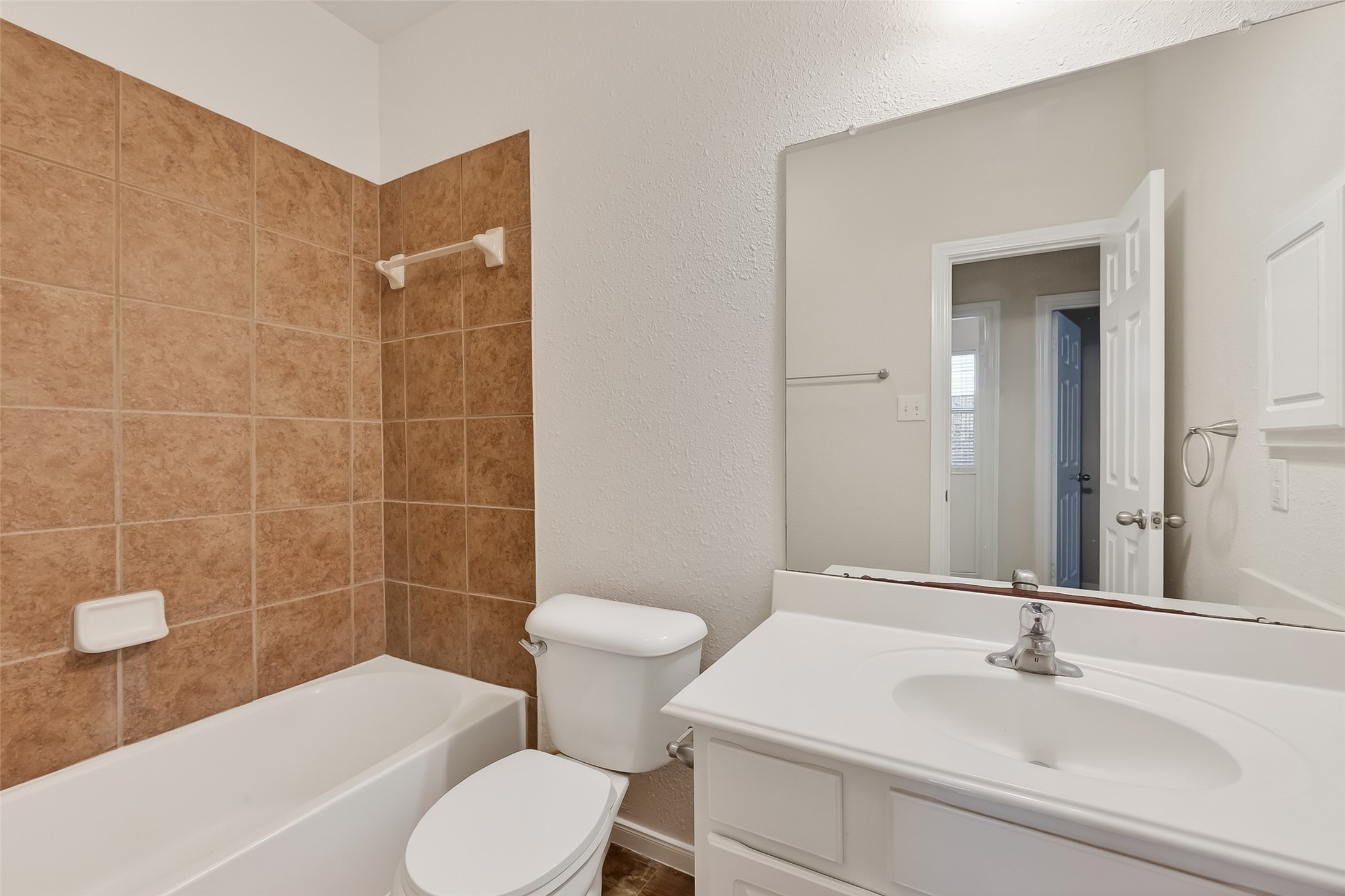 78 South Archwyck Circle Spring, TX 77382 - Photo 31 of 47 a bathroom with a sink a toilet and shower