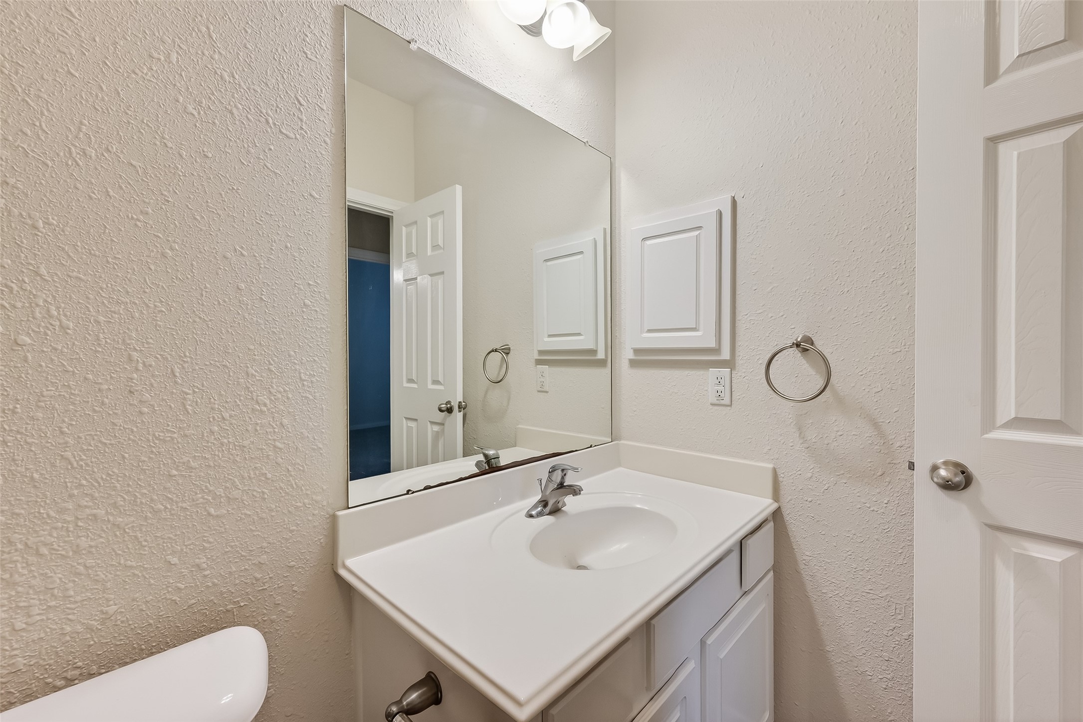 78 South Archwyck Circle Spring, TX 77382 - Photo 32 of 47 a bathroom with a sink toilet and vanity