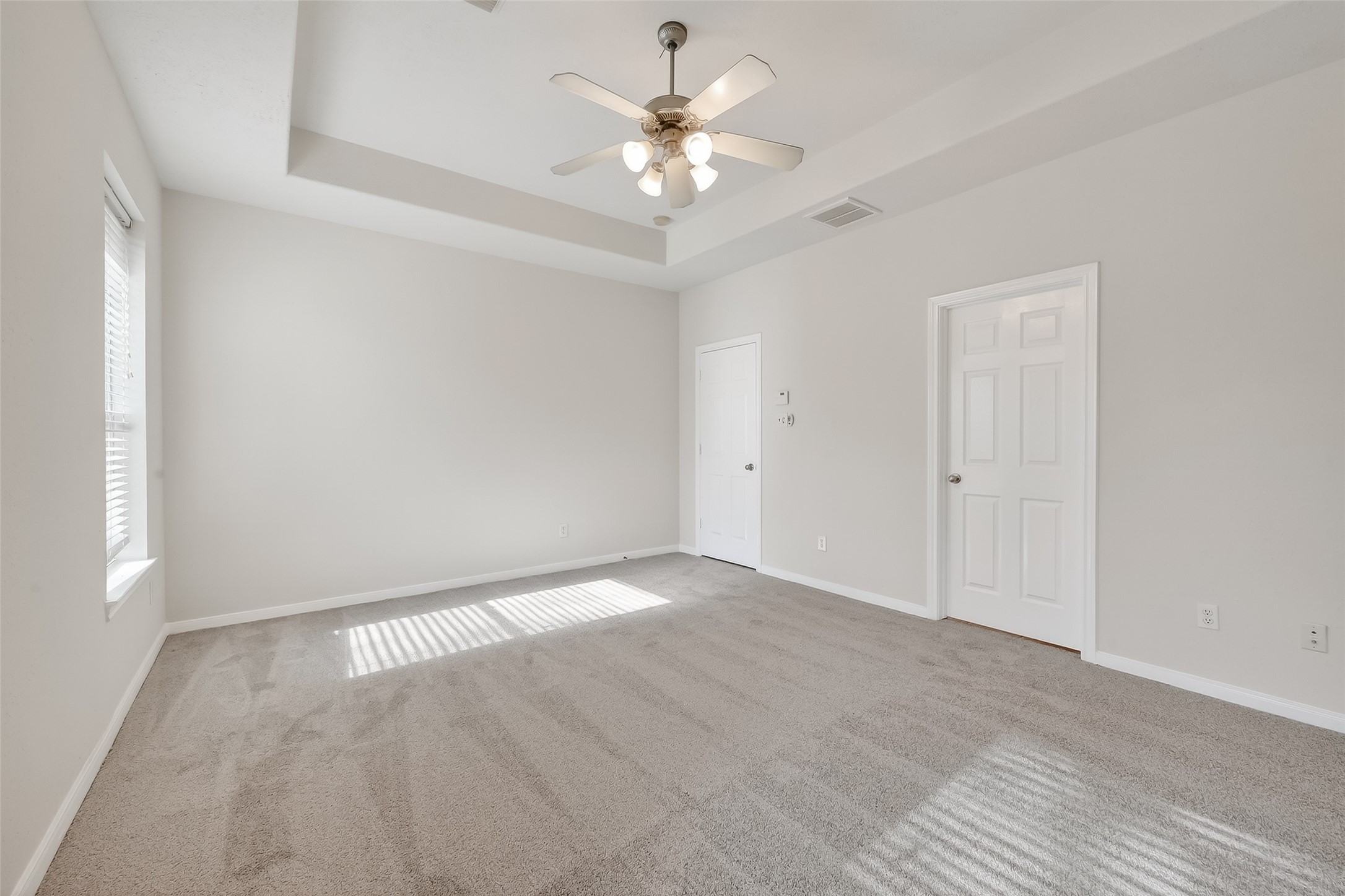 78 South Archwyck Circle Spring, TX 77382 - Photo 36 of 47 a view of an empty room with a ceiling fan and window