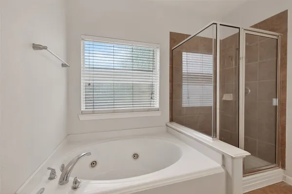 a bathroom with a sink vanity and a mirror
