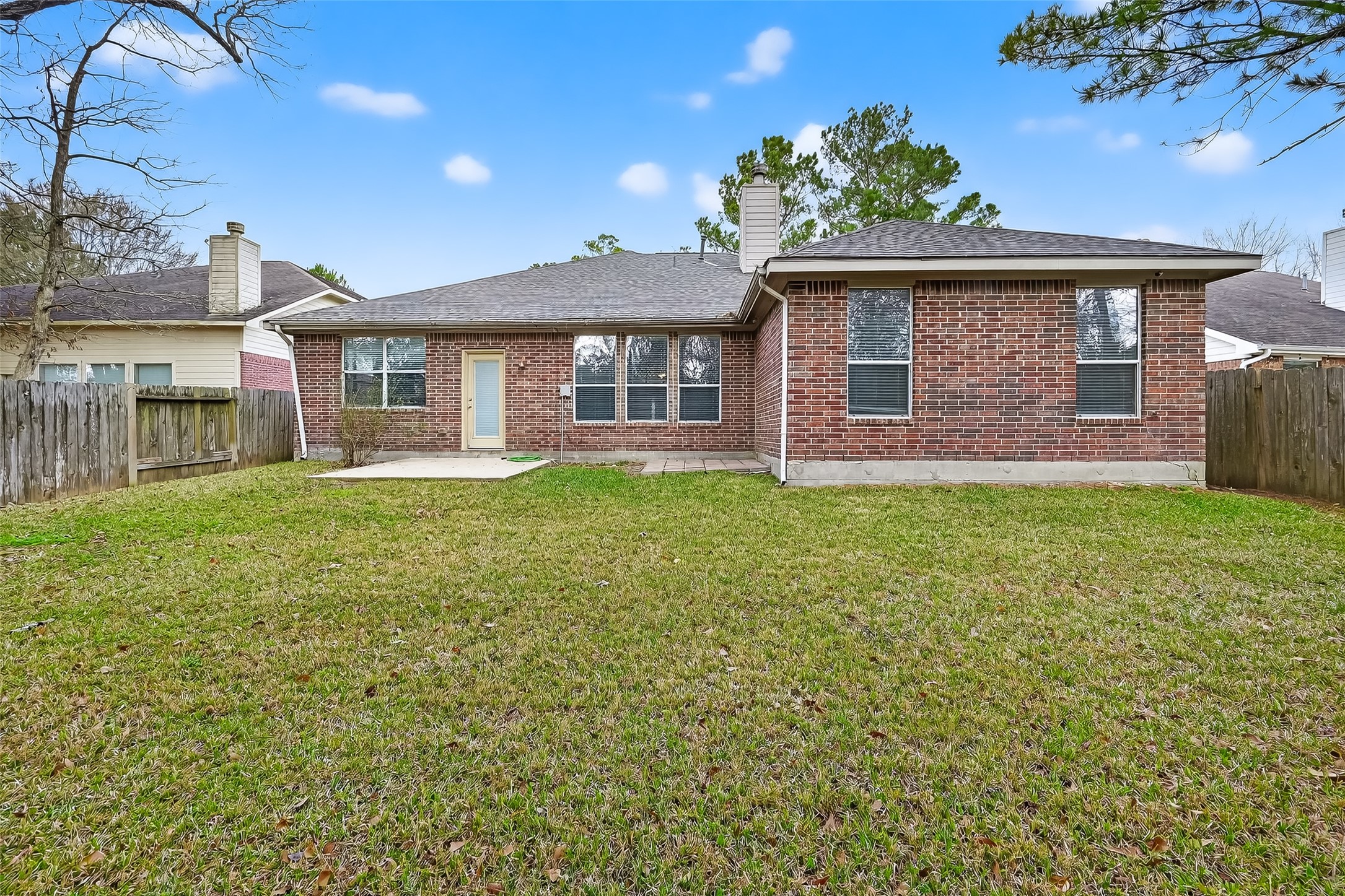 78 South Archwyck Circle Spring, TX 77382 - Photo 45 of 47 a front view of a house with a garden and yard