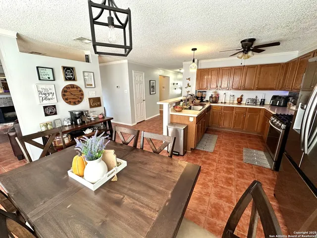 a view of swimming pool with a patio
