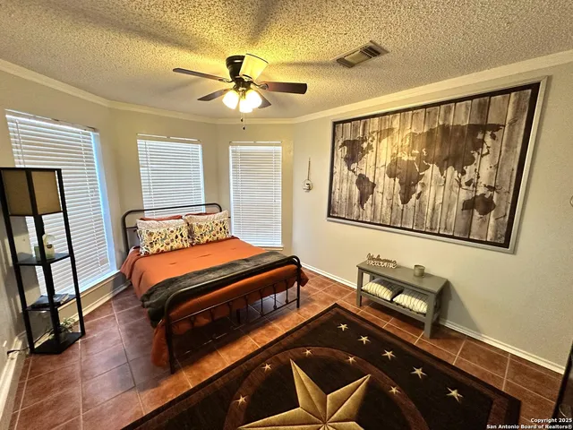 a bed room with a bed and a mirror