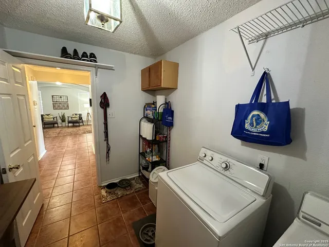 a bathroom with a sink a mirror and vanity