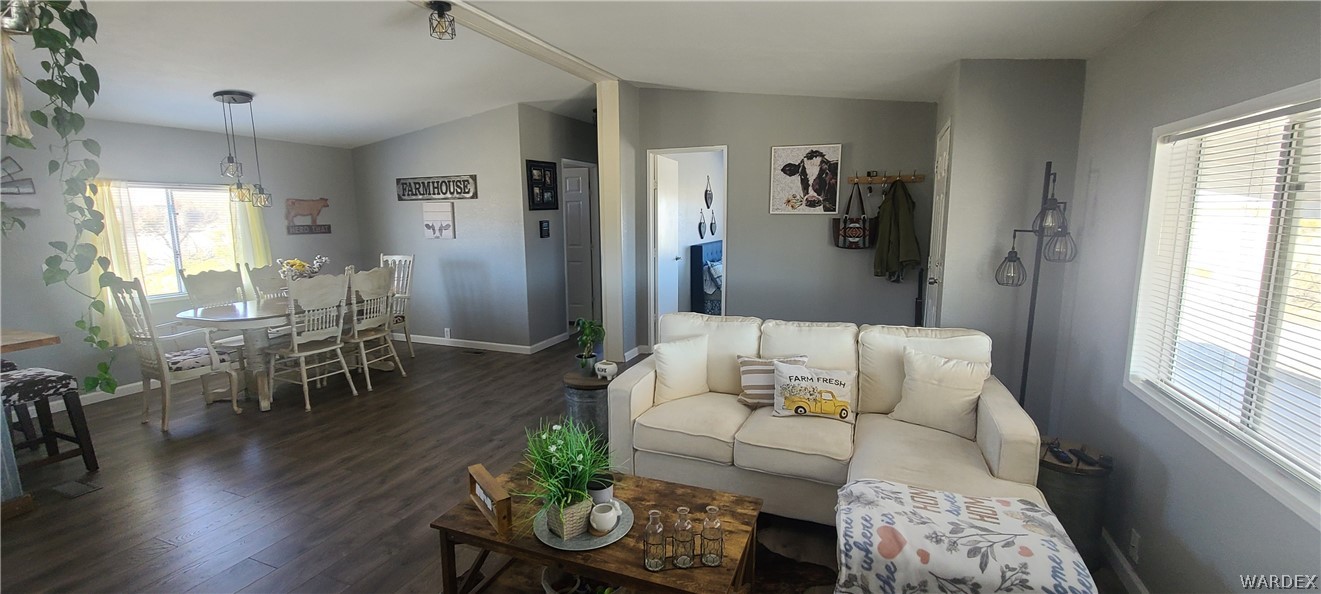 2821 Naco Road Golden Valley, AZ 86413 - Photo 15 of 71 a living room with furniture and wooden floor