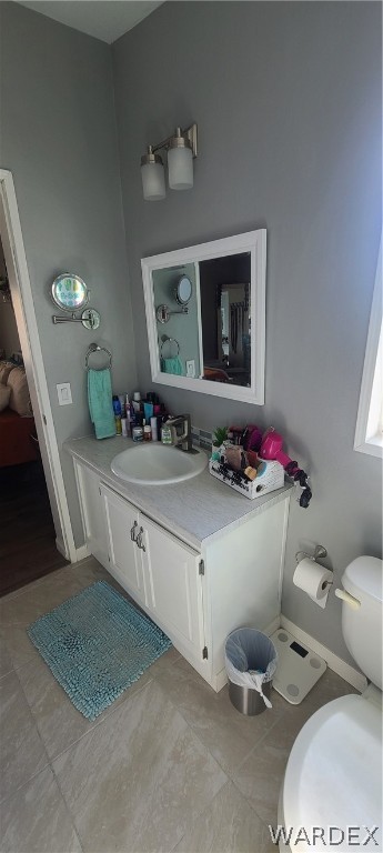 2821 Naco Road Golden Valley, AZ 86413 - Photo 45 of 71 a bathroom with a sink toilet and a mirror