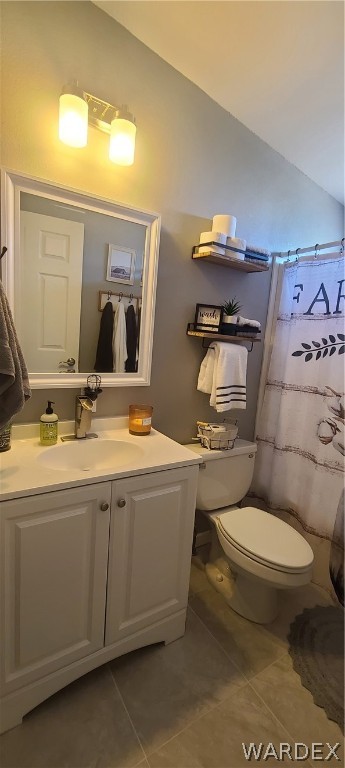 2821 Naco Road Golden Valley, AZ 86413 - Photo 47 of 71 a bathroom with a toilet sink and mirror