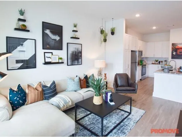 a bed room with a bed and a couch