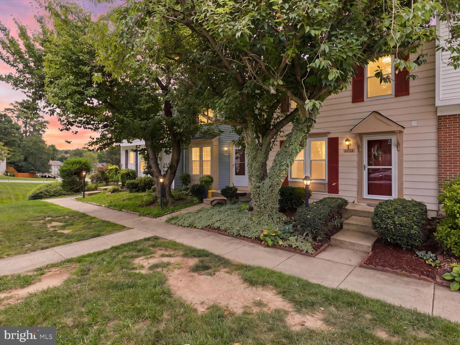 7490 Wounded Knee Road Lorton, VA 22079 - Photo 35 of 40 Charming home with lush greenery.