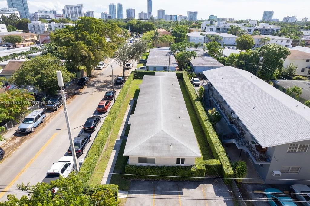 900 Southwest 5th Avenue Miami, FL 33130 - Photo 4 of 10 a aerial view of a house with a yard and lake view