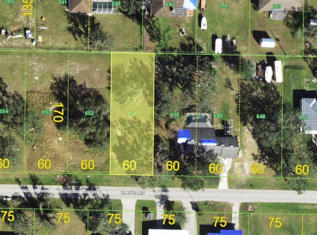 30192 Red Pine Road Punta Gorda, FL 33982 - Photo 1 of 1 an aerial view of a building with swimming pool
