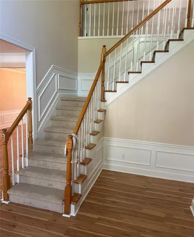 a view of entryway with wooden floor