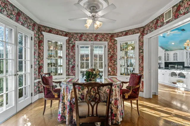 a view of a dining room with furniture window and outside view