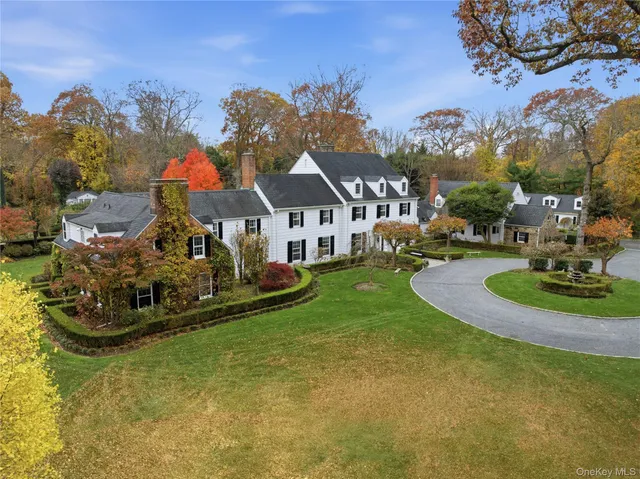a view of house with garden space and street view