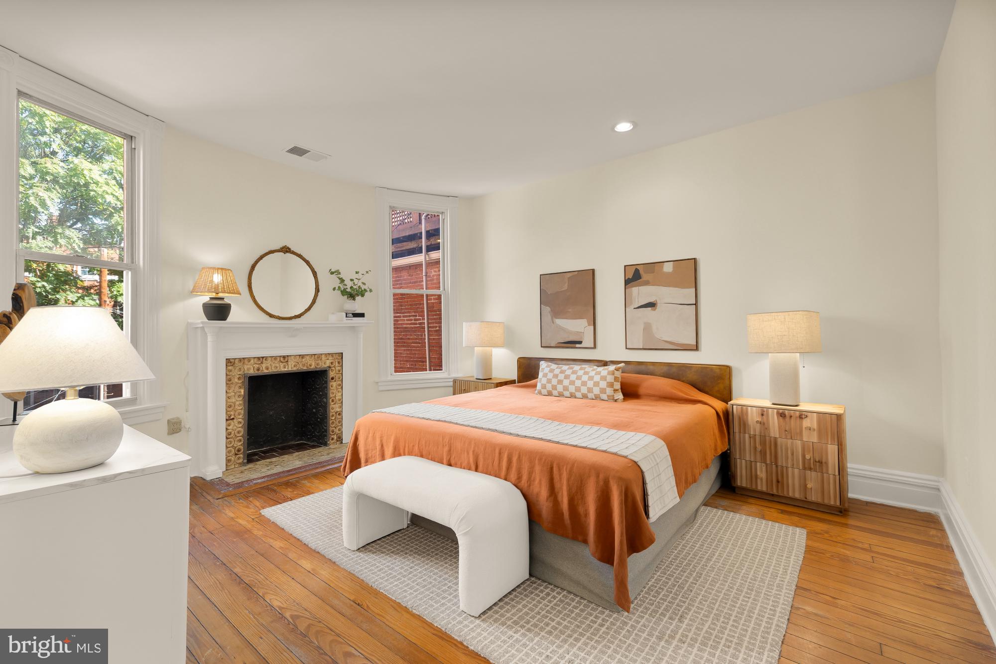1735 Riggs Place Northwest Washington, DC 20009 - Photo 10 of 35 a bedroom with bed and a fireplace