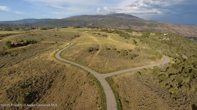 a view of lake and mountain