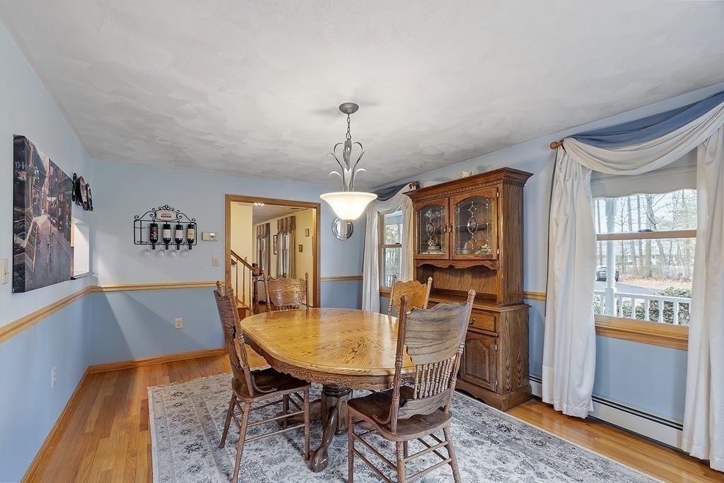 114 Patten Road Tewksbury, MA 01876 - Photo 8 of 39 a view of a dining room with furniture and window