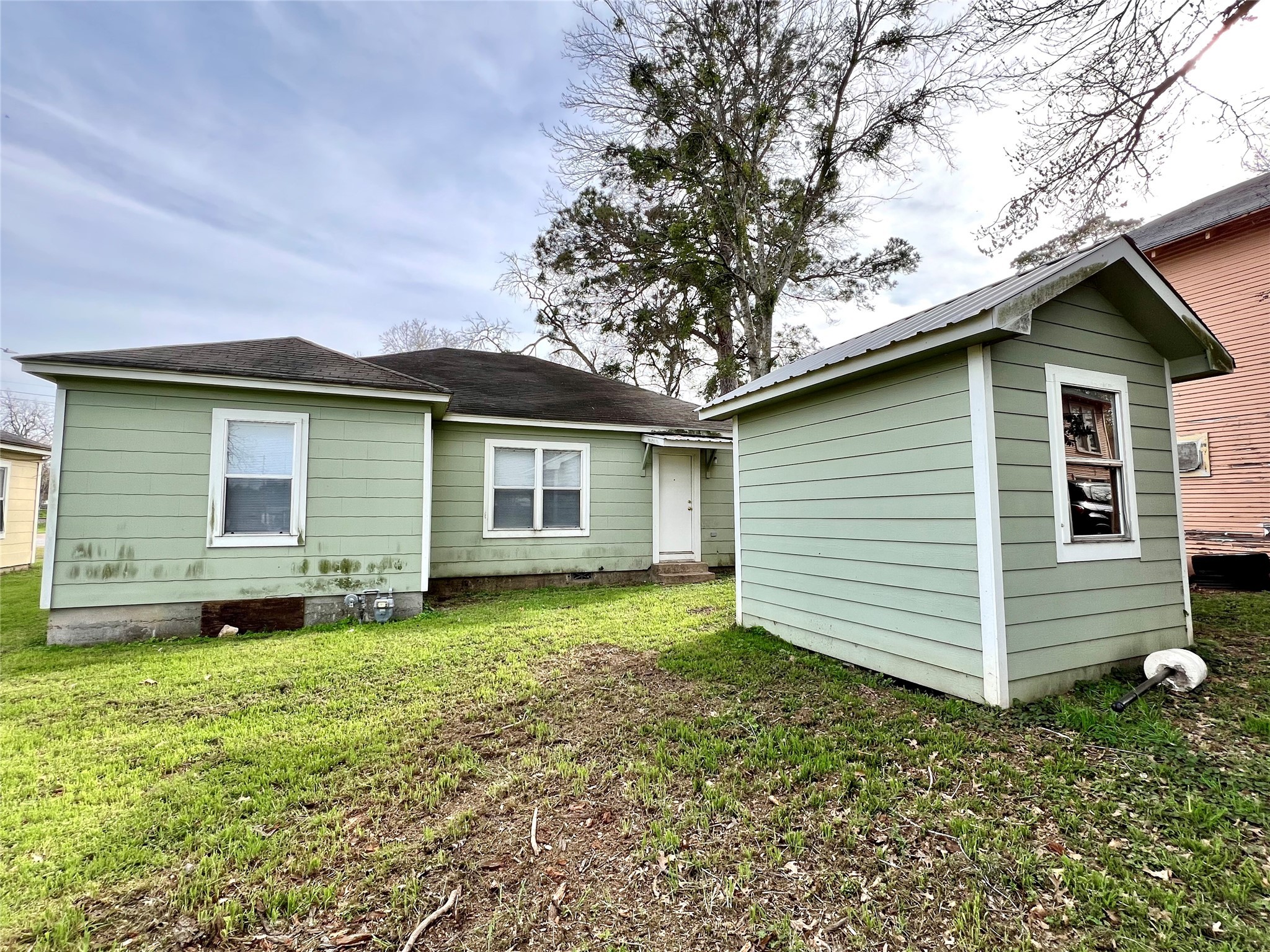 502 West Third Street Brenham, TX 77833 - Photo 6 of 6 a view of a house with a yard