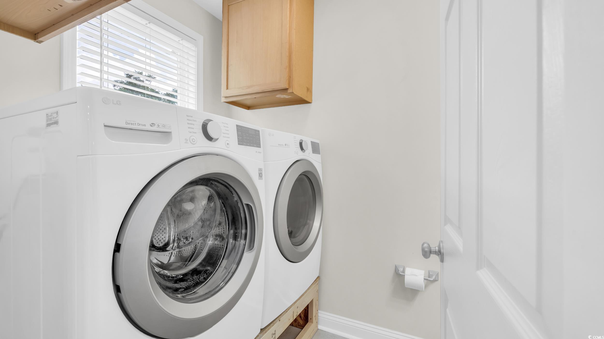 5137 Highway 17 Business, Unit 2B Murrells Inlet, SC 29576 - Photo 19 of 32 Laundry area with independent washer and dryer and cabinet space
