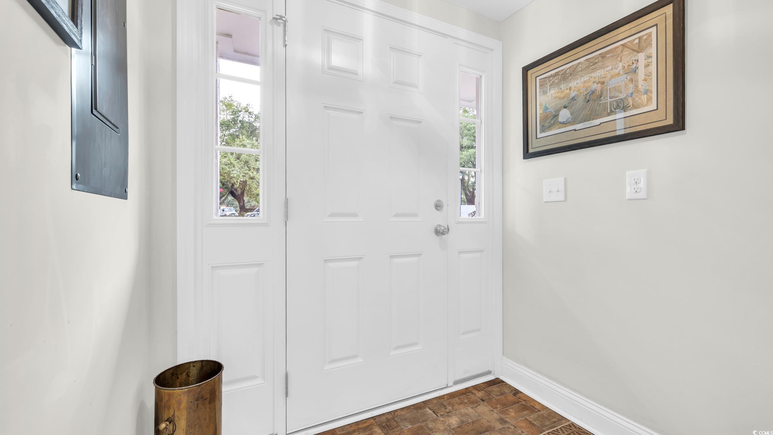 5137 Highway 17 Business, Unit 2B Murrells Inlet, SC 29576 - Photo 4 of 32 Doorway to outside with plenty of natural light, electric panel, and brick patterned floors