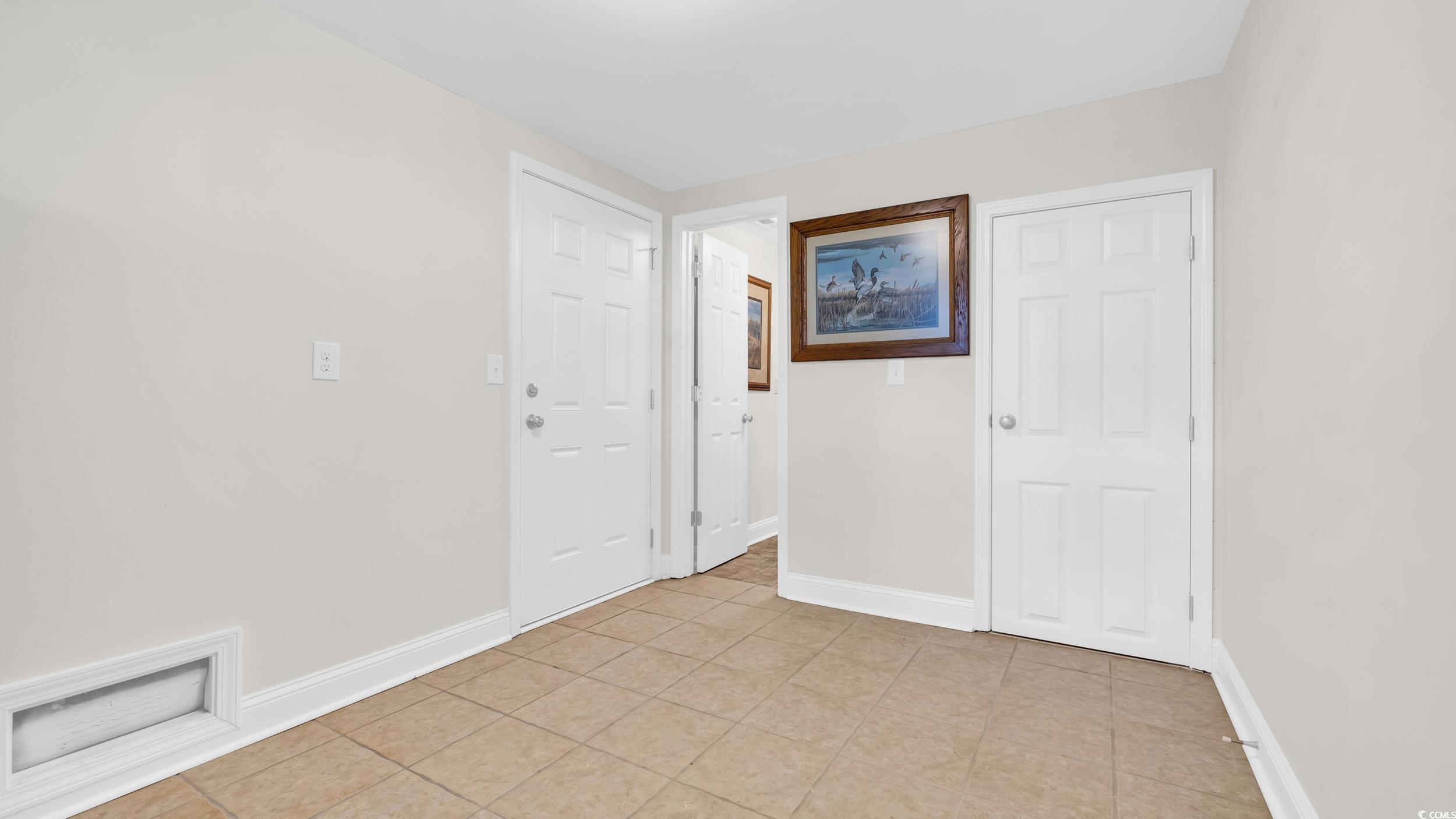 5137 Highway 17 Business, Unit 2B Murrells Inlet, SC 29576 - Photo 7 of 32 Spare room featuring baseboards and light tile patterned floors