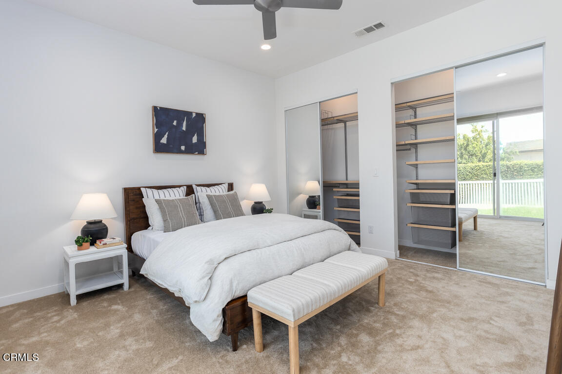 419 Cambridge Drive Burbank, CA 91504 - Photo 28 of 38 a spacious bedroom with a bed and a cabinets
