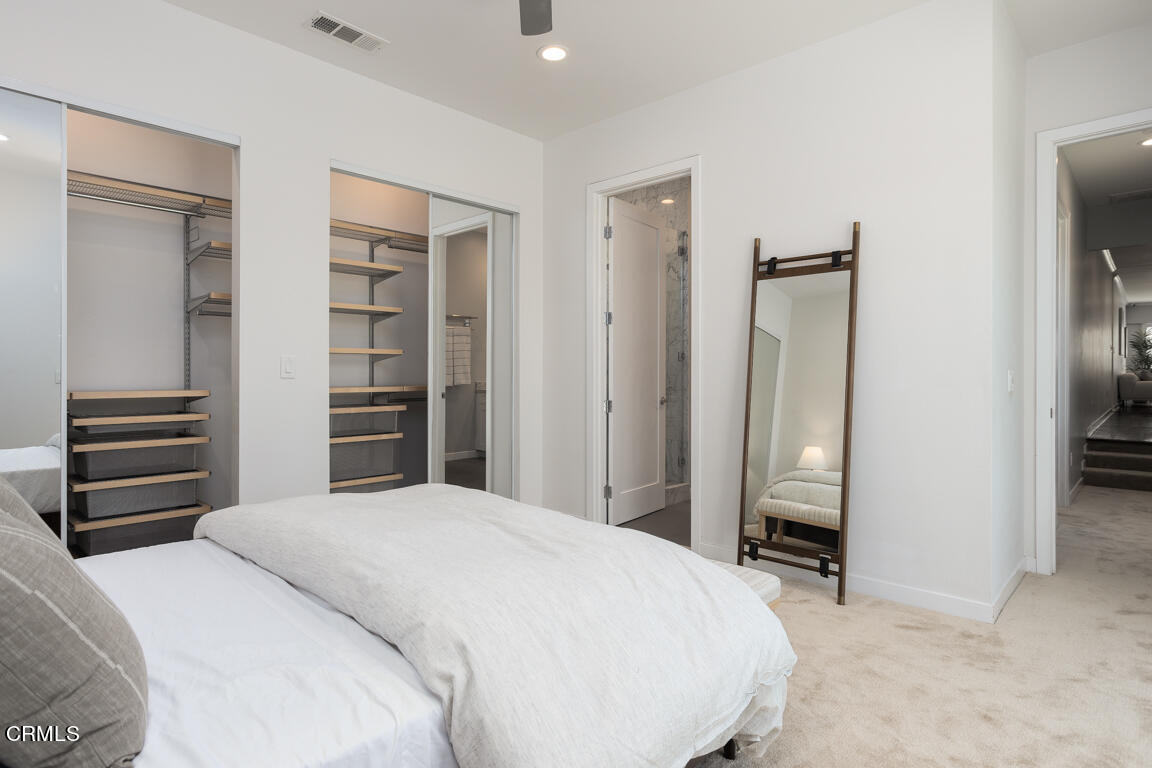 419 Cambridge Drive Burbank, CA 91504 - Photo 29 of 38 a bedroom with a bed and a walk in closet