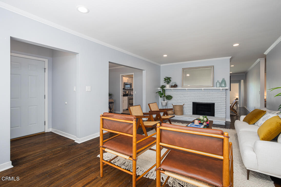 419 Cambridge Drive Burbank, CA 91504 - Photo 6 of 38 a work room with furniture and a fireplace