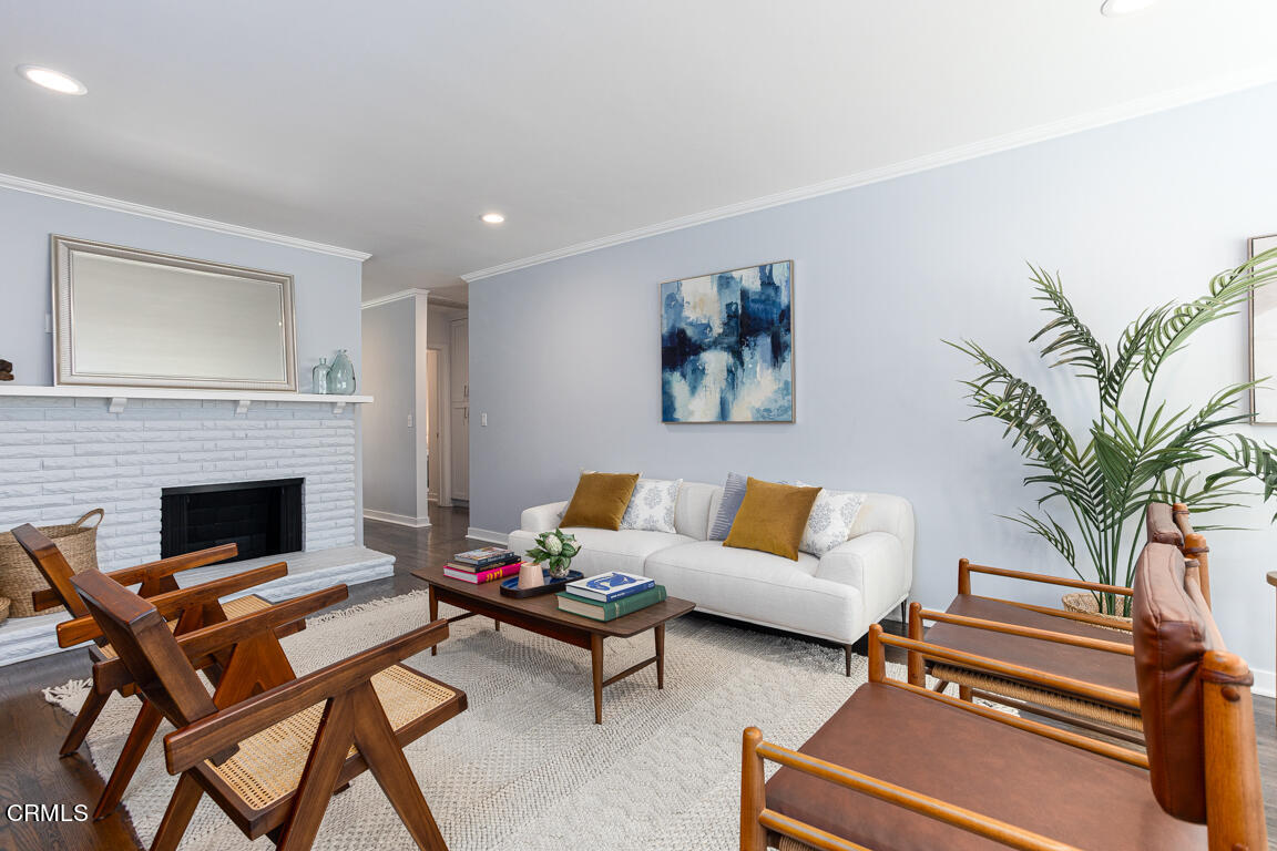 419 Cambridge Drive Burbank, CA 91504 - Photo 7 of 38 a living room with furniture and a fireplace